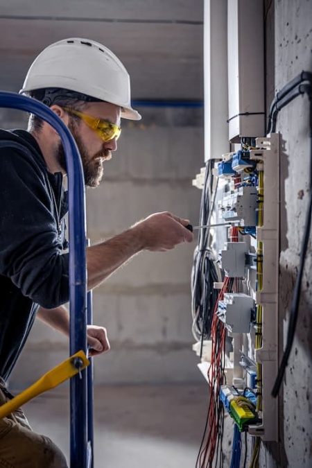 a-male-electrician-works-in-a-switchboard-with-an-2025-03-13-03-08-57-utc (1).jpg